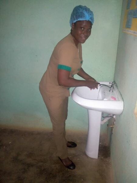 Monica-washing-her-hands-after-a-procedure